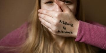 Powerful image highlighting the message 'Silence is Violence' to raise awareness on social issues.